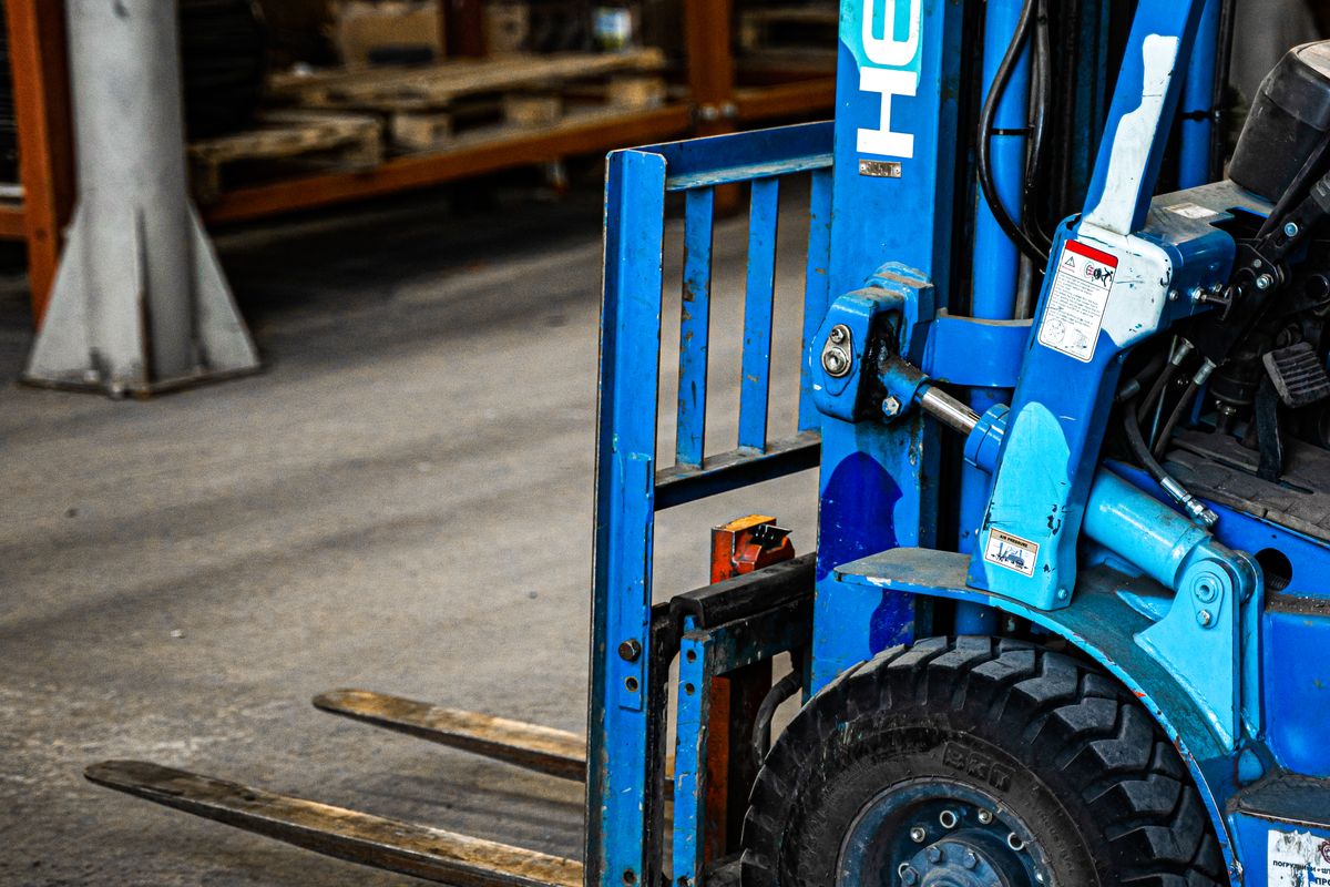 Forklift parked inside a warehouse