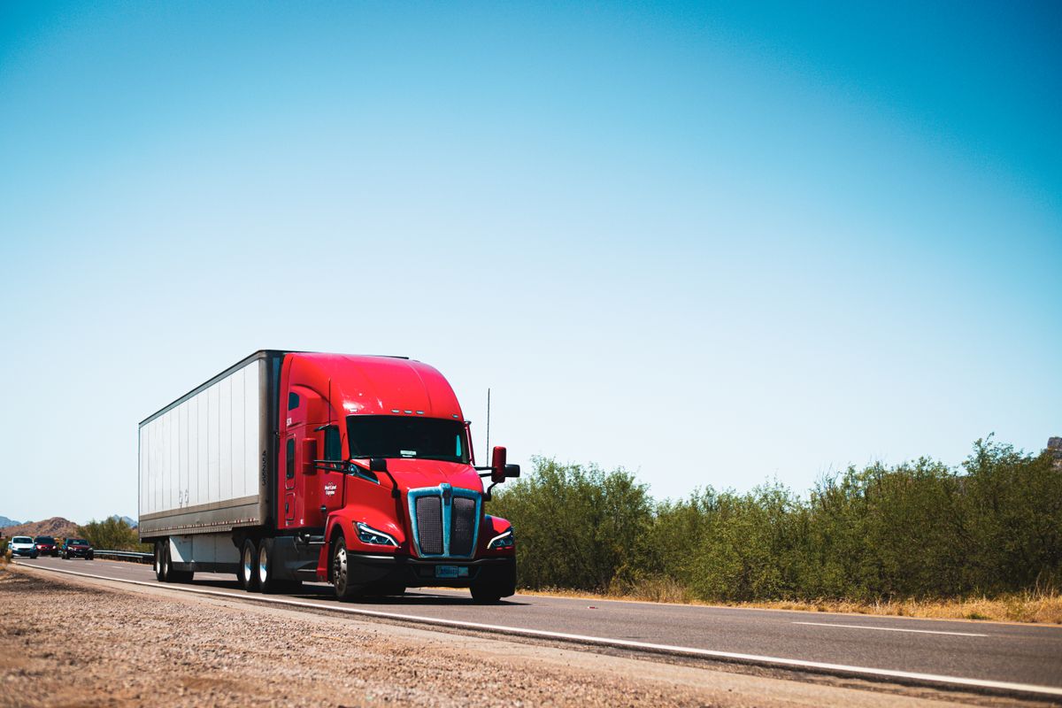 Semi-trailer truck on an open highway