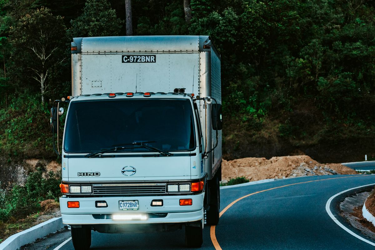 Rigid truck on a winding forest road