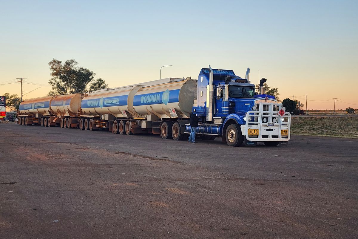 Road train at sunset in outback Queensland