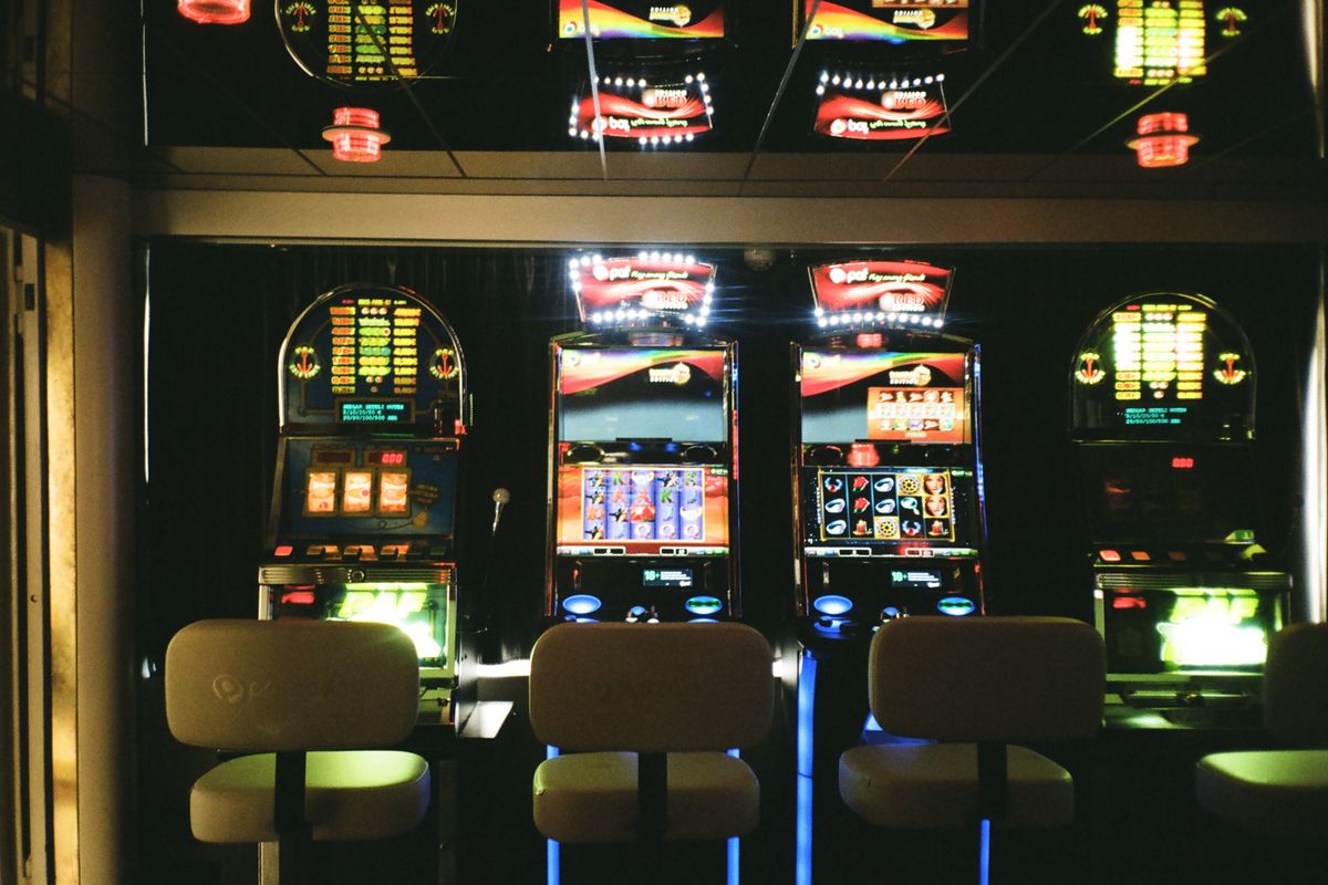 Gaming machines in a dimly lit venue
